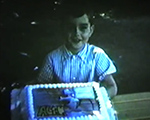 8mm_04 059 1965 6122 Alan 5th birthday Huckleberry Hound Roselyn cake